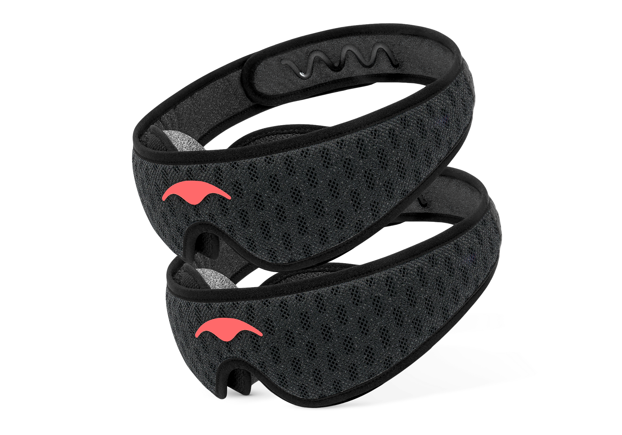 Two Carbon Black Manta Sleep Mask PRO units stacked diagonally, featuring a dark mesh pattern and bright coral Manta Sleep logos.