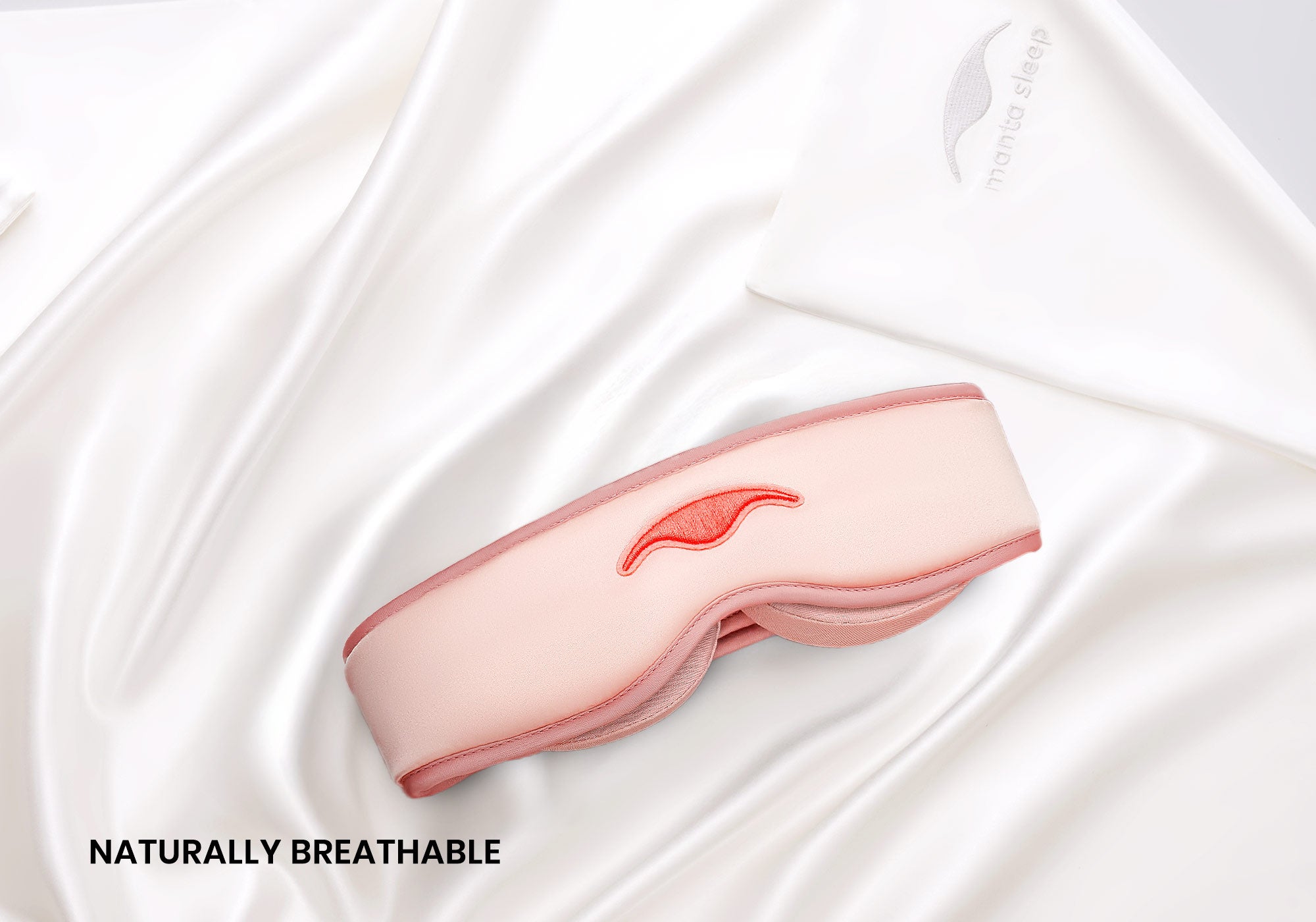 Sunset Pink Manta SILK Sleep Mask on top of a pearl white Manta Silk Pillowcase, captioned: "Naturally breathable".