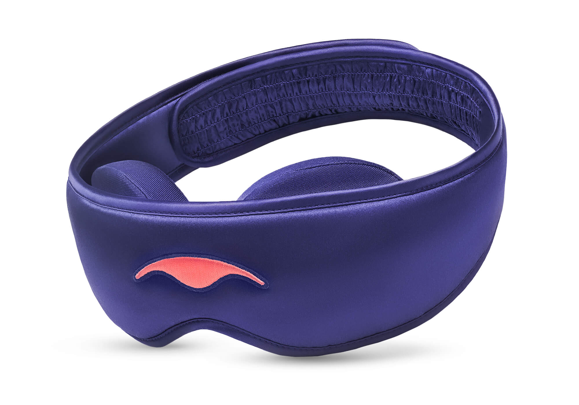 Three-quarter studio shot of the Manta SILK Sleep Mask in lustrous purple, featuring an embroidered coral logo and a ruched back strap section.