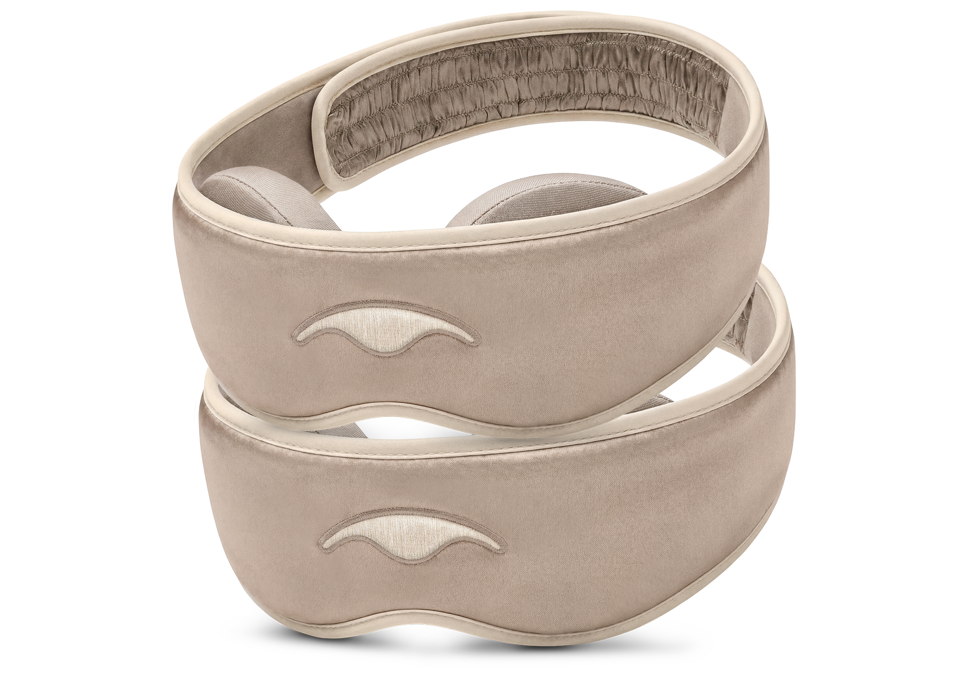 Three-quarter studio shot of two Manta SILK Sleep Masks in Tranquil Taupe, each featuring an embroidered beige logo and a ruched back strap section.