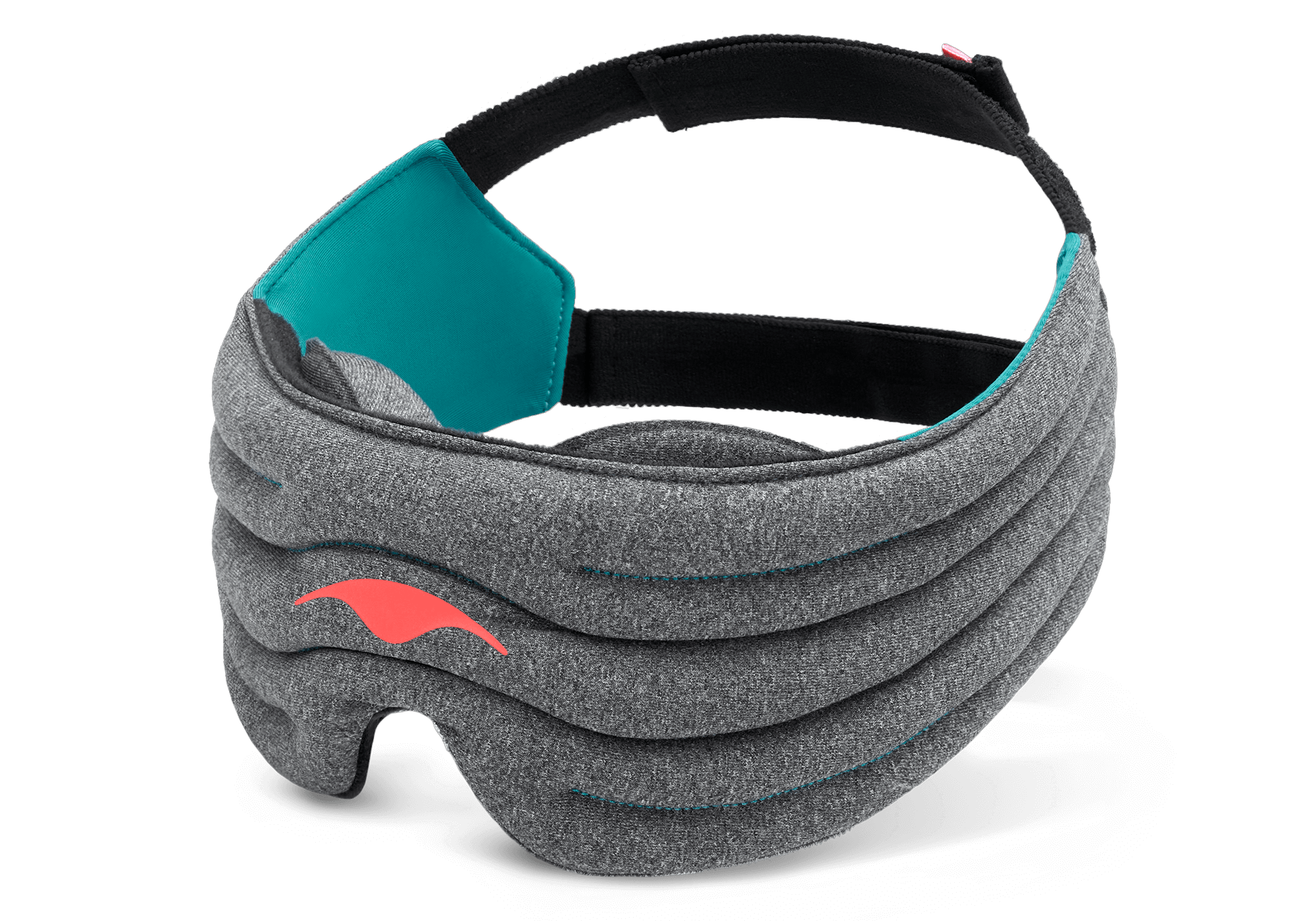 A product shot of the dark heather-gray Manta WEIGHTED Sleep Mask angled against a plain white background. The mask has a segmented, thickly padded front body with a vibrant coral-red Manta ray emblem on the left. The inner lining features a bright teal fabric section on the side panel, transitioning into a wide, adjustable black head strap.