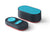 Studio shot of the dark gray and teal Manta Sleep white noise speaker and pill-shaped remote control pad isolated on a white background.