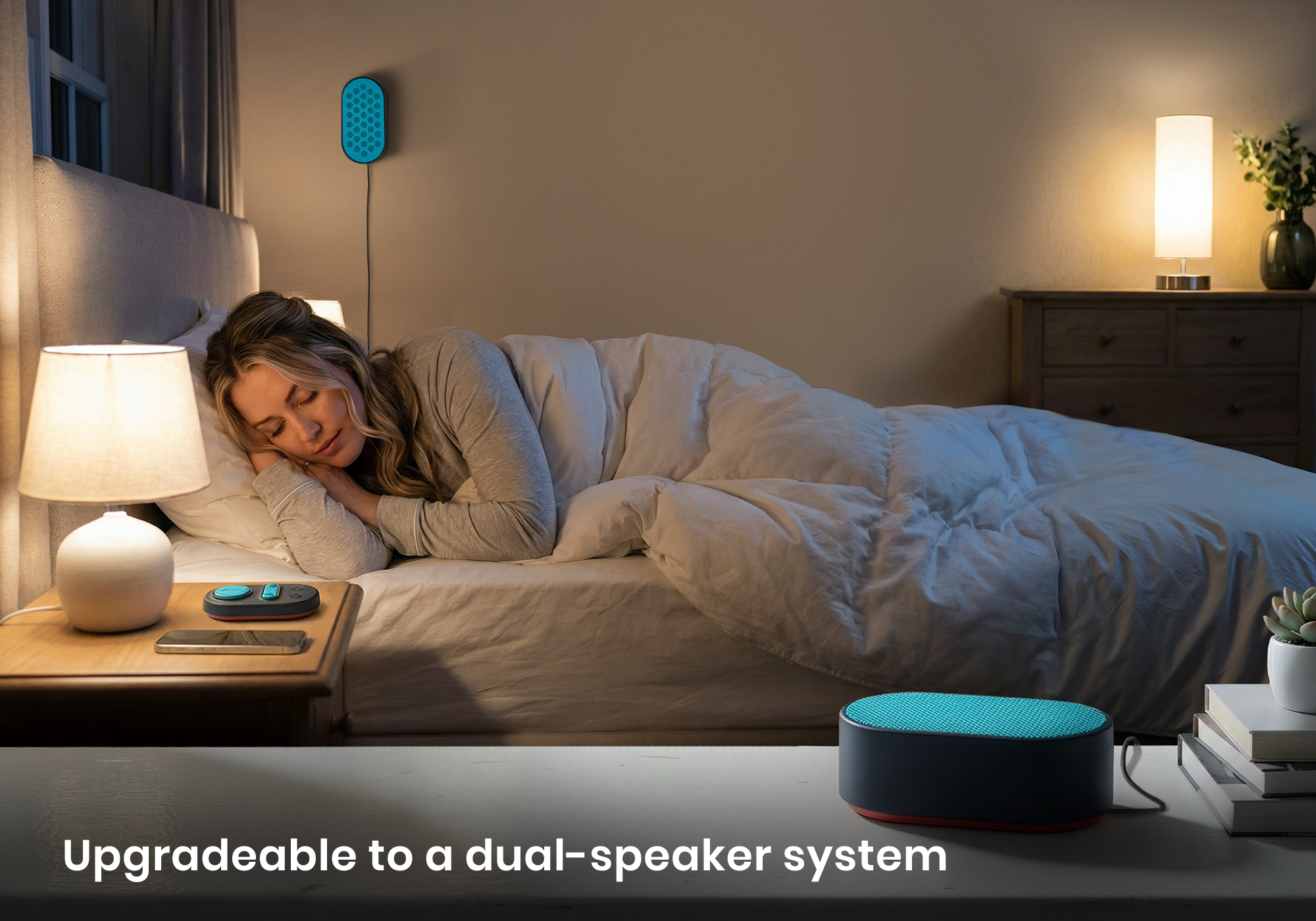 A woman sleeps peacefully in bed, demonstrating a dual-speaker system with one teal speaker on the wall and another on a foreground table, with text "Upgradeable to dual-speaker system".