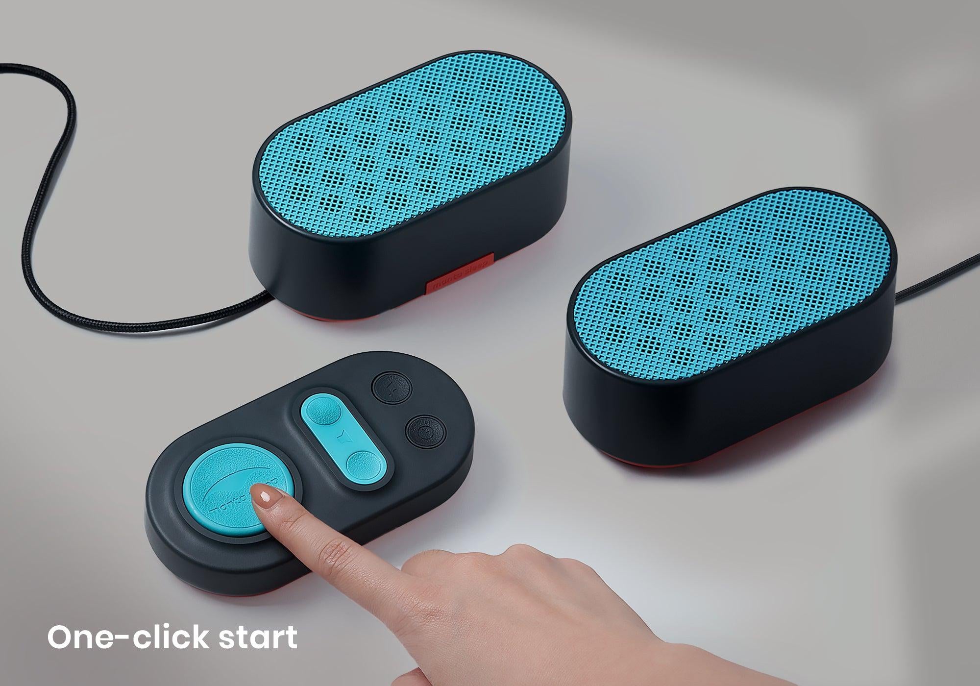 A hand presses the large teal button on a remote control pad next to two black oval speakers on a gray surface, with text "One-click start".