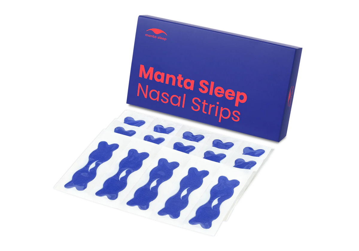 A blue Manta Sleep Nasal Strips product box standing next to several blue nasal strips in clear backing sheets, isolated on white.