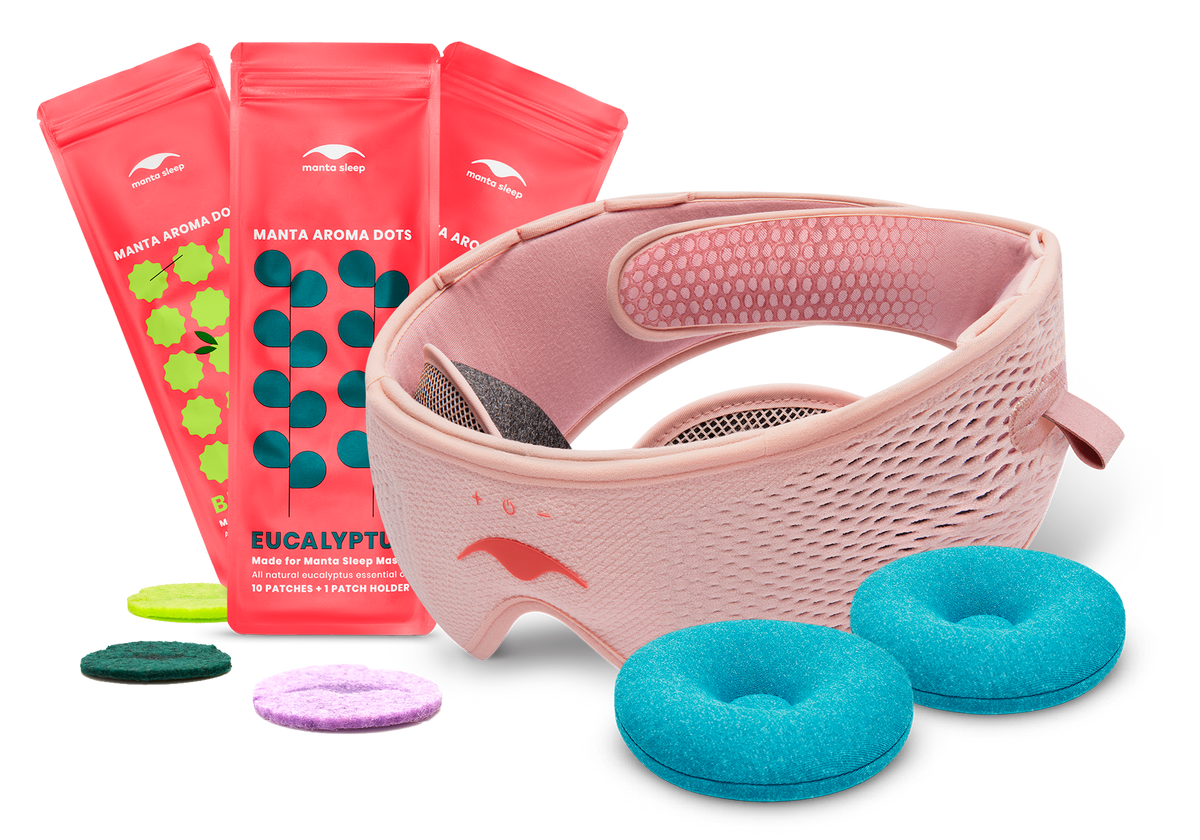 Pink Manta SOUND Mask displayed with blue COOL eye cups, three aroma dot packets, and loose aroma patches.