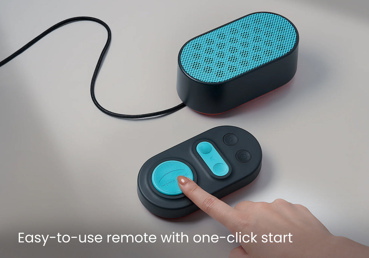 Hand pressing the teal button on a black Manta Sleep remote. Text: Easy-to-use remote with one-click start.