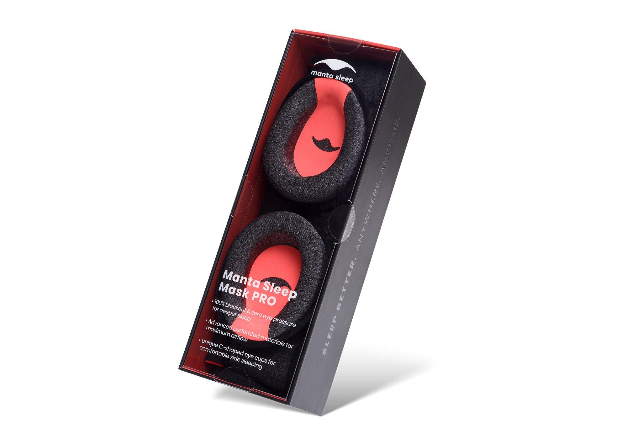 The Manta PRO Sleep Mask packaged in a sleek black box with red accents, highlighting its 100% blackout and breathable material features.