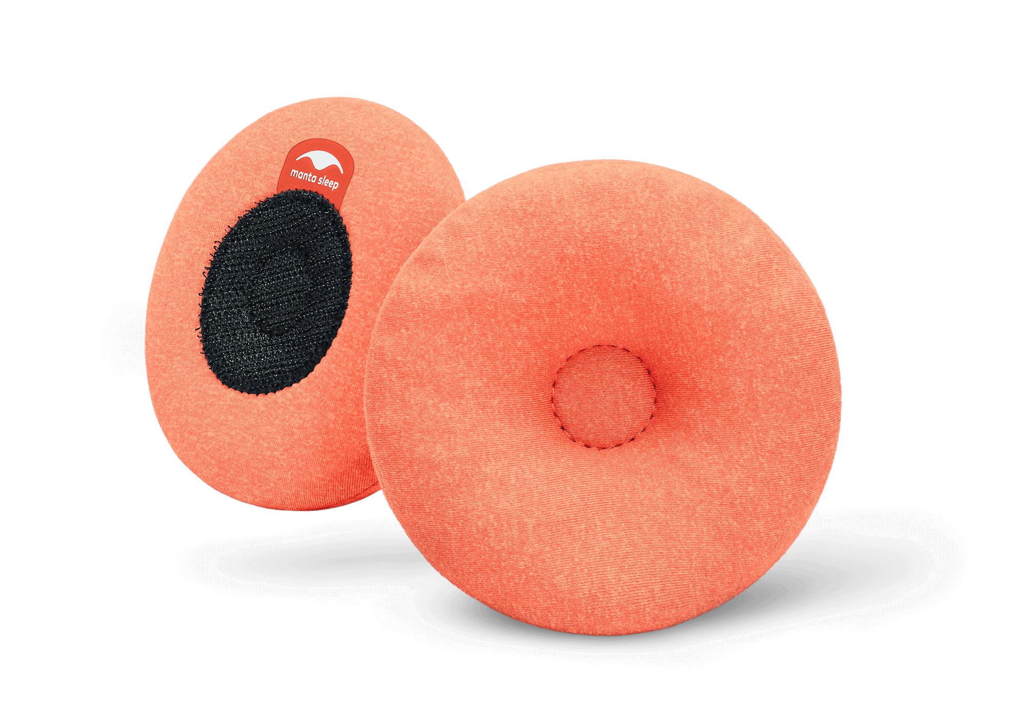 A pair of round orange Manta STEAM Eye Cups, showing the indented front side and the black hook-and-loop back side on white.