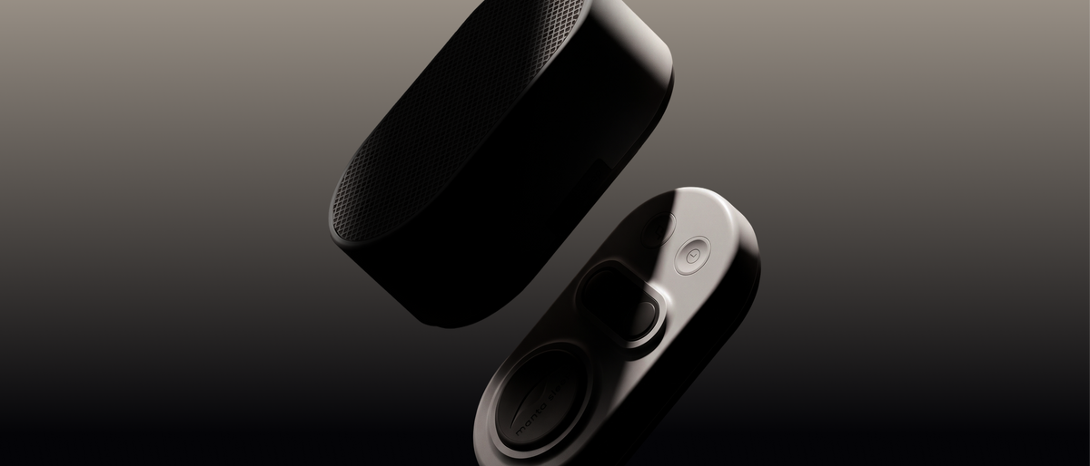 Floating speaker and remote pad of White Noise Machine in stone white color on a gradient background.