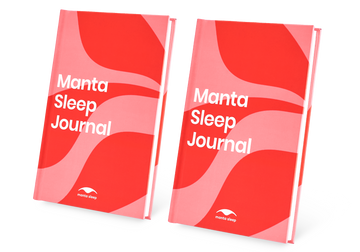 Two Manta Sleep Journals with red and pink wavy covers standing side-by-side, isolated on a white background.