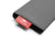 Close-up view of the corner of the folded grey pouch focusing on a bright red fabric tag with the white Manta Sleep logo.